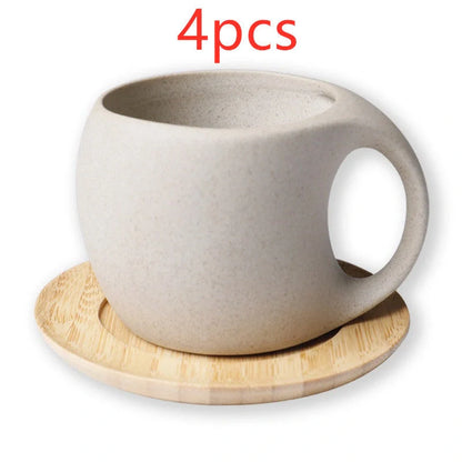 Elegant Ceramic Cold Brew Kettle Set with matching cups on bamboo tray