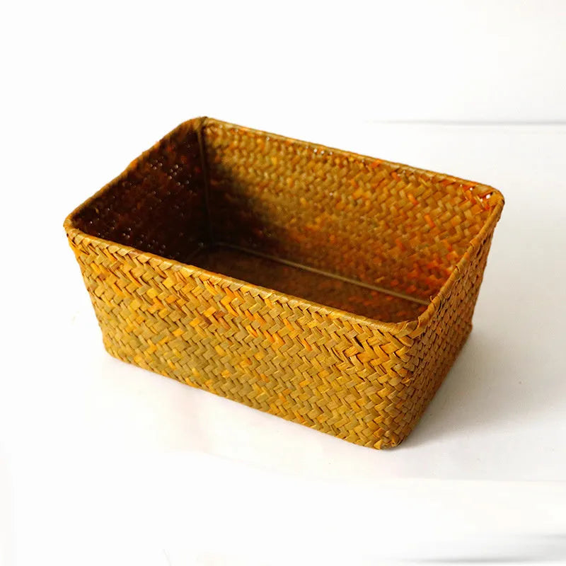 Straw desk storage box in brown colour with rectangular compartments for pen and cosmetic organisation