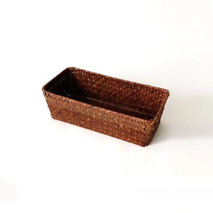 Straw desk storage box in brown colour with rectangular compartments for pen and cosmetic organisation