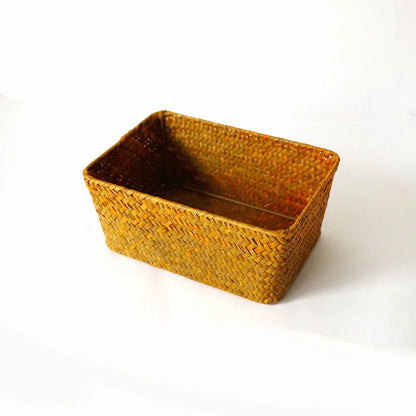 Straw desk storage box in brown colour with rectangular compartments for pen and cosmetic organisation