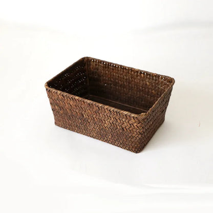 Straw desk storage box in brown colour with rectangular compartments for pen and cosmetic organisation