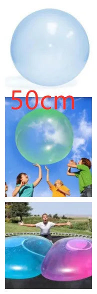 Large pink, yellow, green, and blue inflatable bouncy balls in various sizes for children's play.