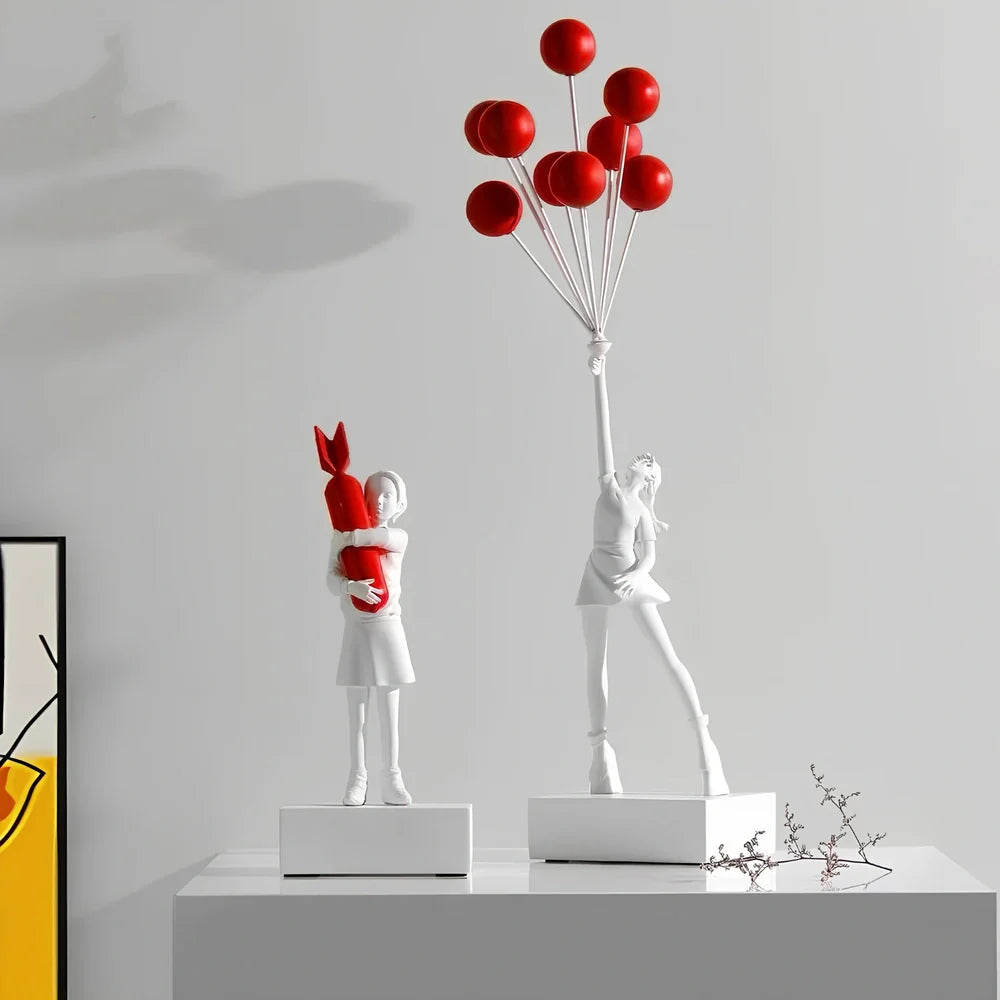 Bubble Girl natural resin sculpture ornament in white with red ball, 10-15 cm tall hanging modern decor piece