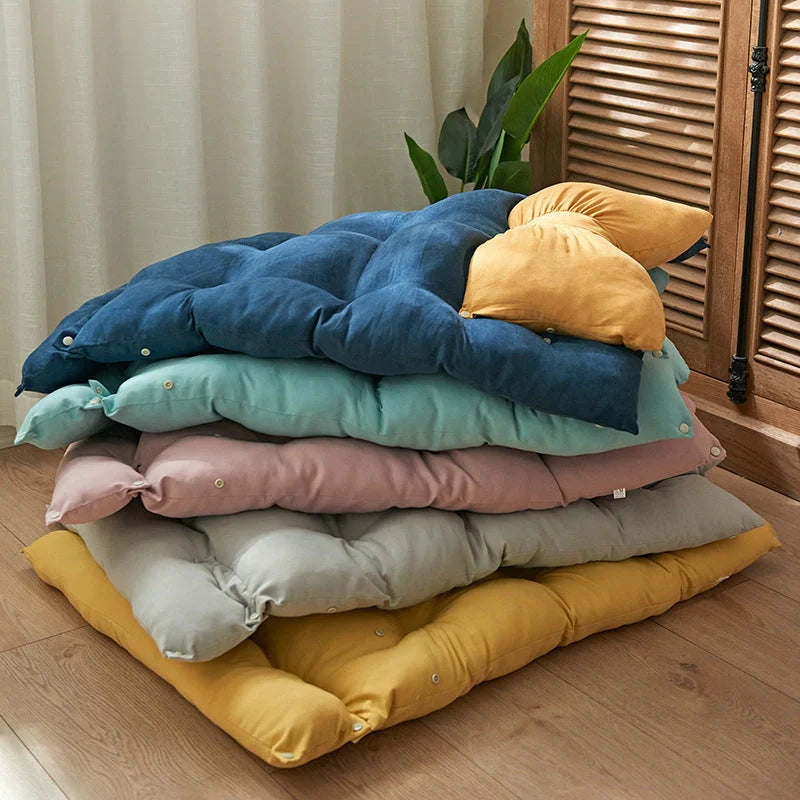 Four Seasons Universal Pet Mattress in light pink, yellow, and blue, suitable for small, medium, and large pets