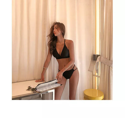 Black deep V slim swimsuit with chest pad for women, made from quick-drying polyester