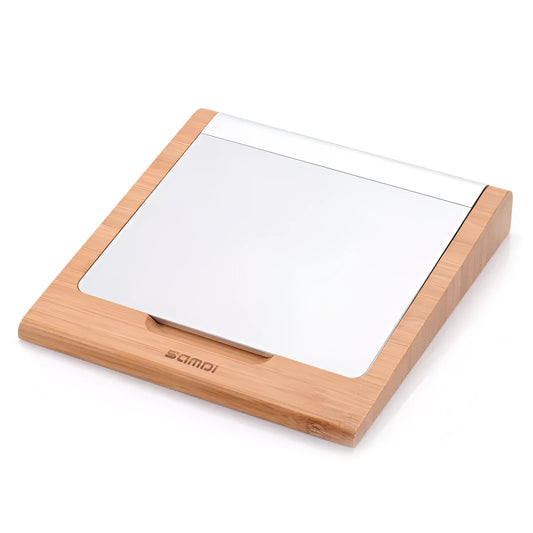 Bamboo wood stand holding an Apple tablet and an Apple Bluetooth trackpad side by side.