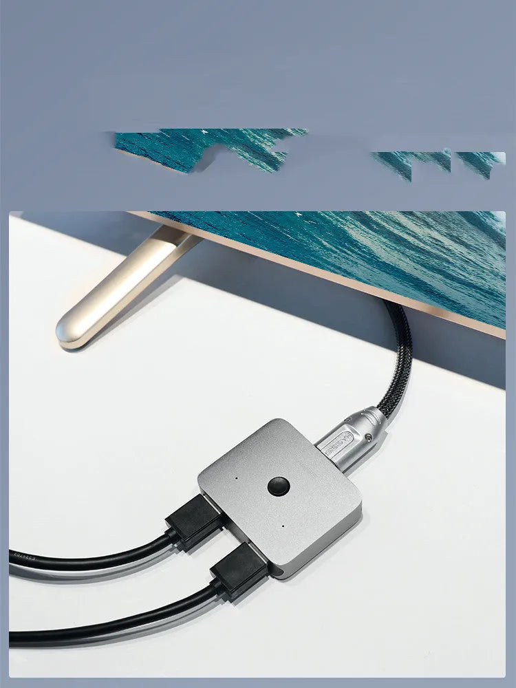 Grey HDMI splitter device with one input and two output ports for screen duplication