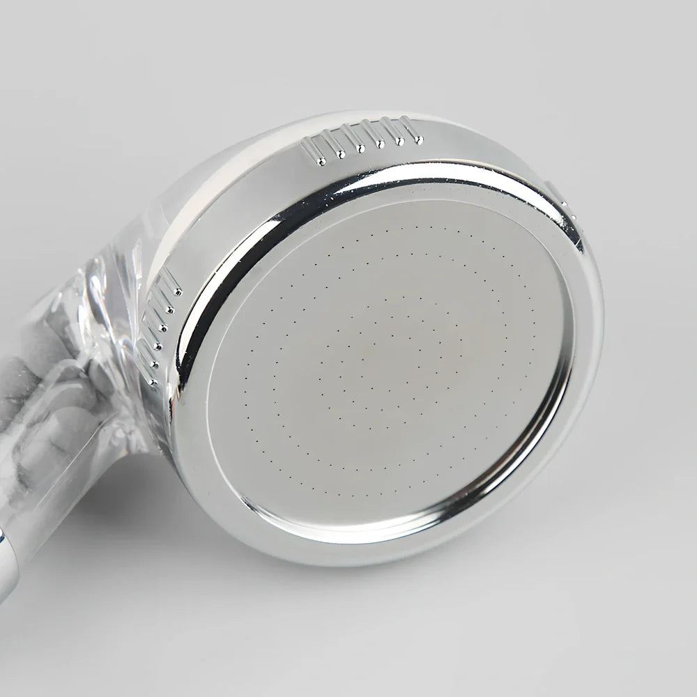 Hand-held negative ion shower nozzle with pressure boost function and multiple configuration options