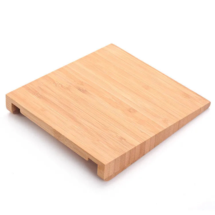 Bamboo wood stand holding an Apple tablet and an Apple Bluetooth trackpad side by side.