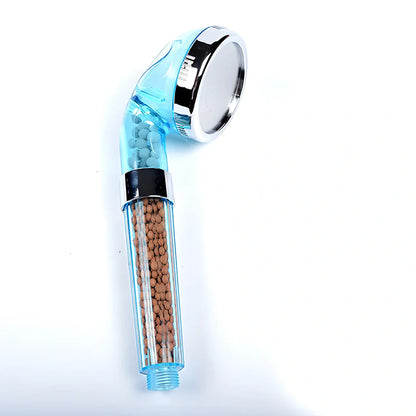 Pressurised shower head with stainless steel panel showing three water mode settings and removable nozzles