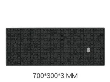 Grey cloth wrist sticker for computer mouse on a desk, showing non-slip base.