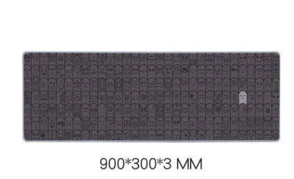 Grey cloth wrist sticker for computer mouse on a desk, showing non-slip base.