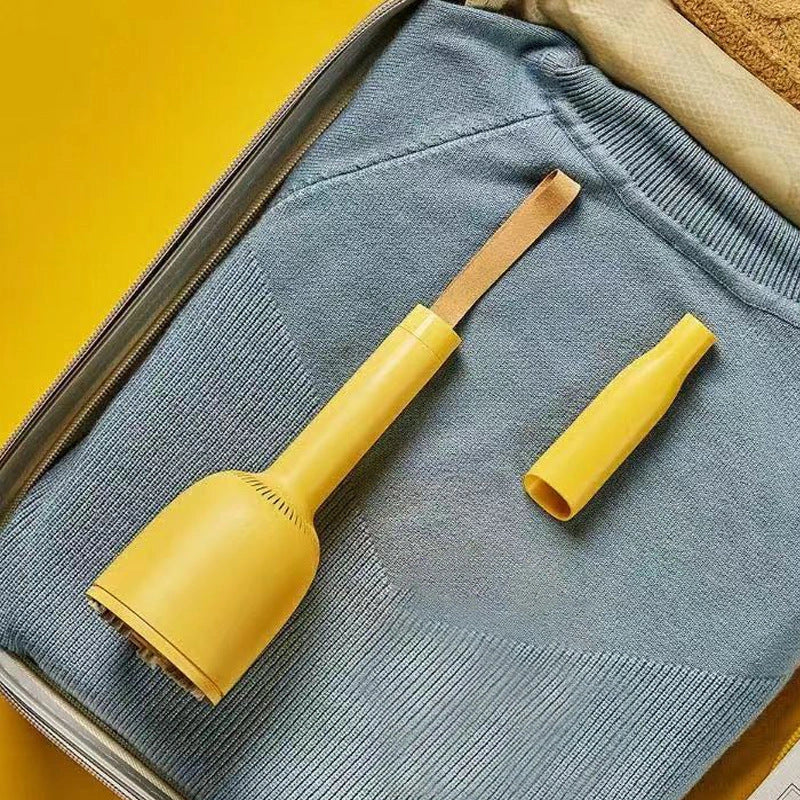 Mini wireless vacuum cleaner with hairball trimmer and USB charging cable