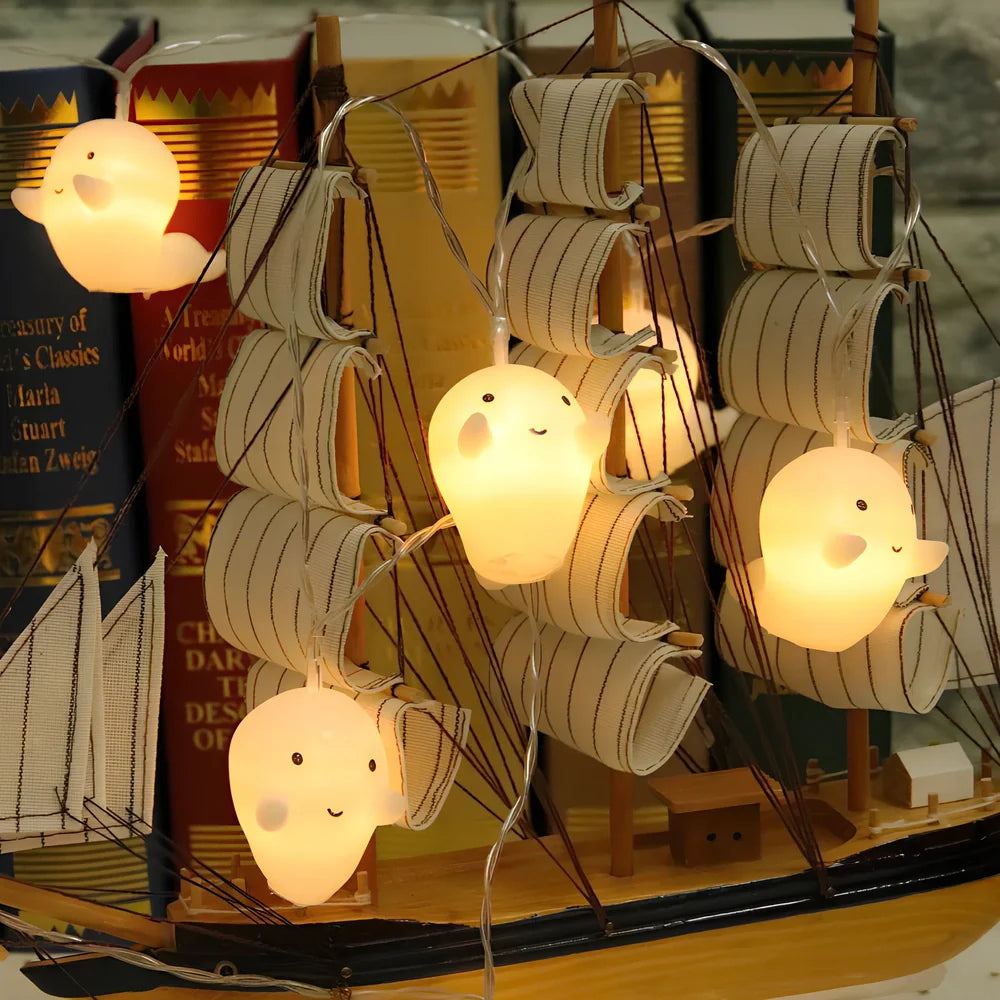 Pumpkin ghost LED Halloween lantern with warm white lights in Nordic design, showing cartoon elements and multiple length options