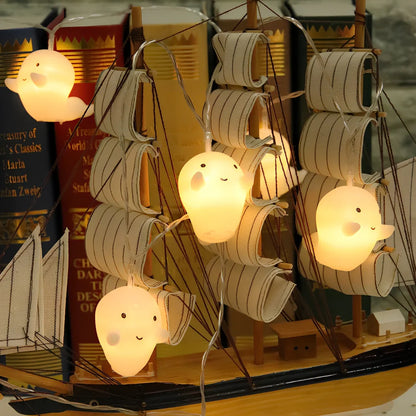 Pumpkin ghost LED Halloween lantern with warm white lights in Nordic design, showing cartoon elements and multiple length options