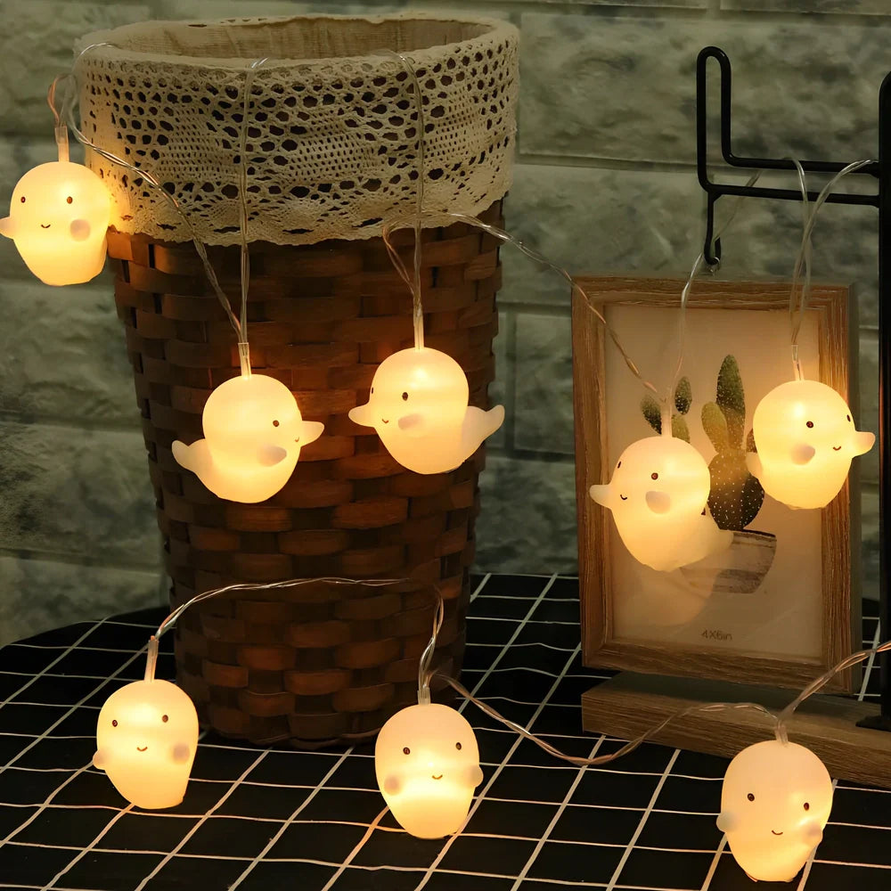 Pumpkin ghost LED Halloween lantern with warm white lights in Nordic design, showing cartoon elements and multiple length options