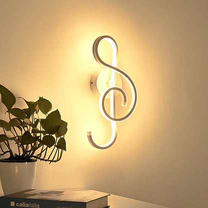 LED wall lamp with musical note acrylic shade showing 140mm width, 370mm height, and black or white colour options
