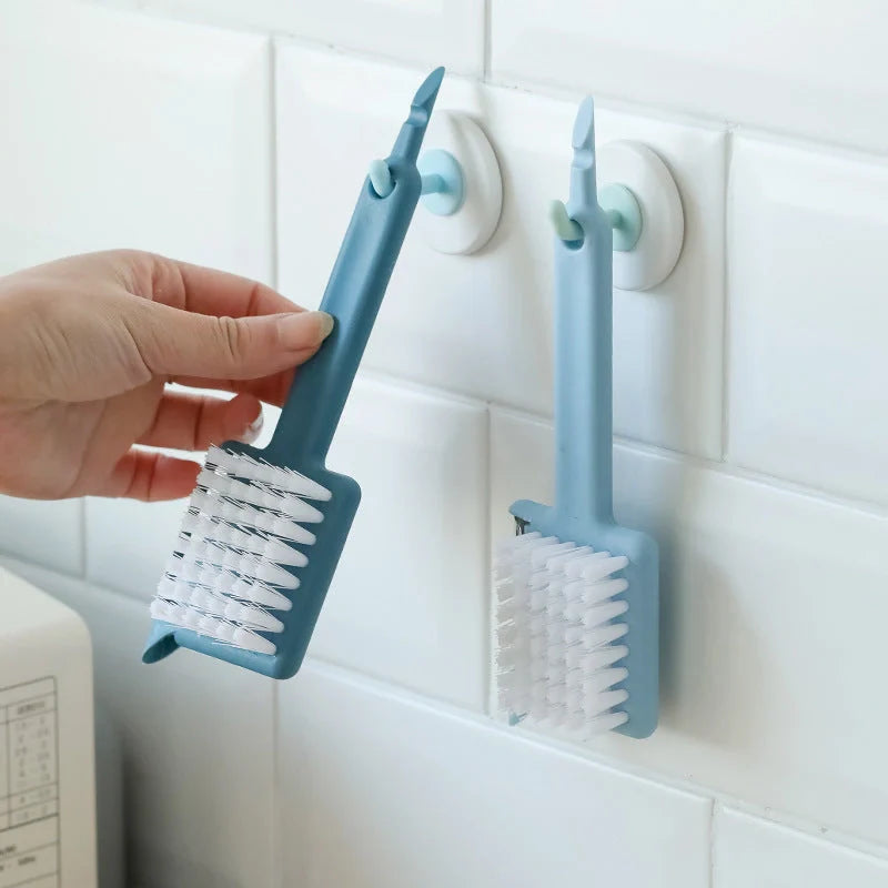 Multifunctional kitchen tool for peeling, brushing, opening, and grinding