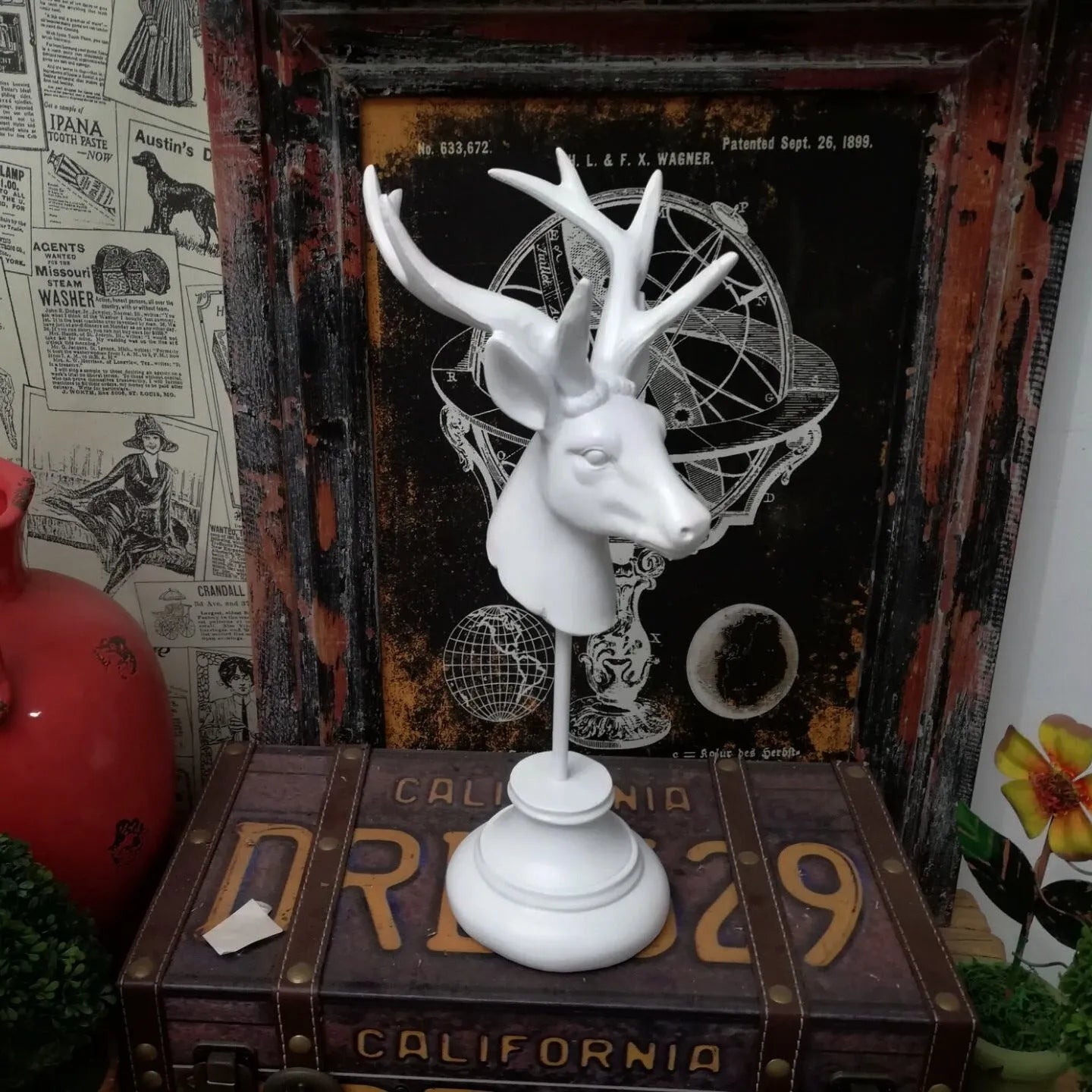 Natural resin animal sculpture home decoration in black, white, and wood colour finishes.