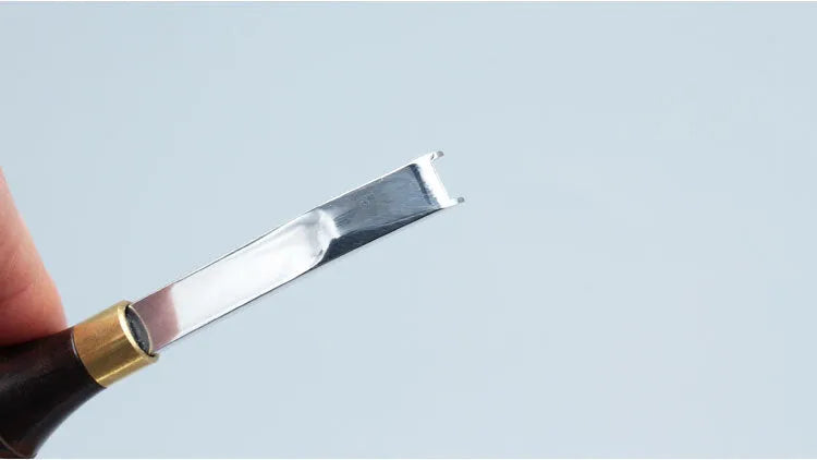 Sectional cutting wide shovel edge thinning knife drum shovel wide shovel edge thinner for leather crafting and leatherwork tools in classic style.