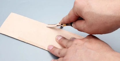 Leather crafting wide shovel edge thinning knife and drum shovel hand tool.