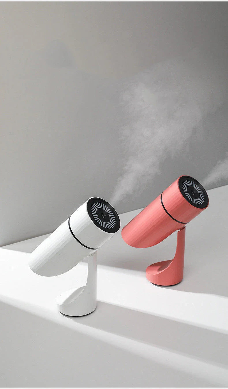 Compact USB powered humidifier with adjustable 90-degree mist direction, colorful night light, and whisper-quiet ultrasonic technology