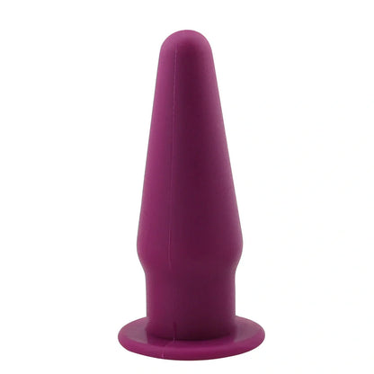 Premium silicone vibrating anal plug in black, rose red, and purple colors. Discreet and sophisticated intimate stimulator.
