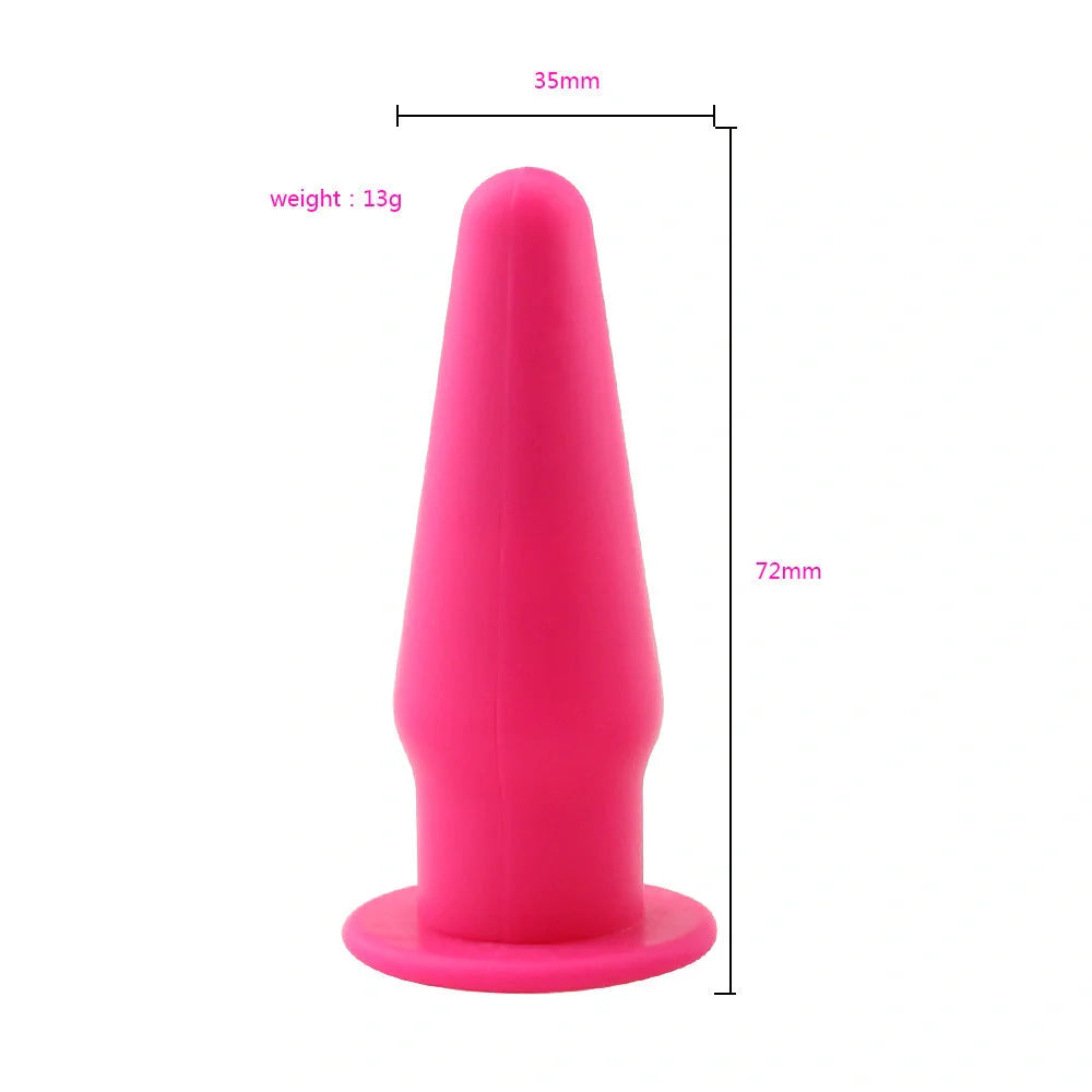 Premium silicone vibrating anal plug in black, rose red, and purple colors. Discreet and sophisticated intimate stimulator.