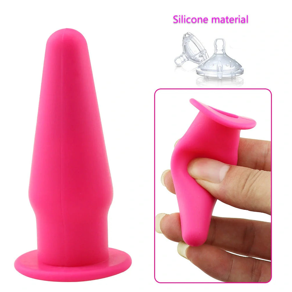 Premium silicone vibrating anal plug in black, rose red, and purple colors. Discreet and sophisticated intimate stimulator.