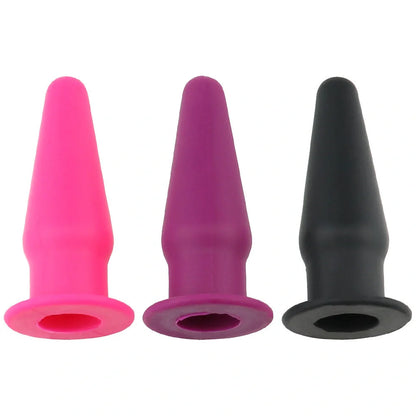 Premium silicone vibrating anal plug in black, rose red, and purple colors. Discreet and sophisticated intimate stimulator.