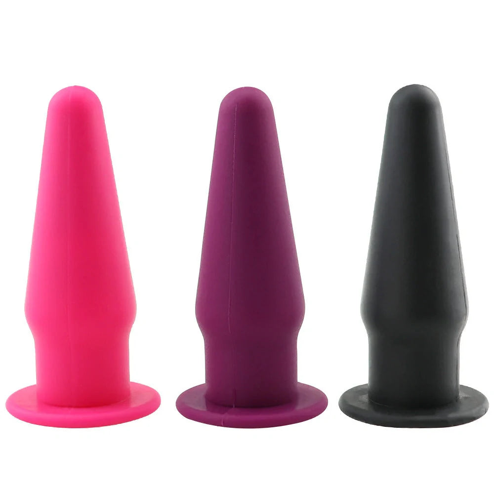 Premium silicone vibrating anal plug in black, rose red, and purple colors. Discreet and sophisticated intimate stimulator.