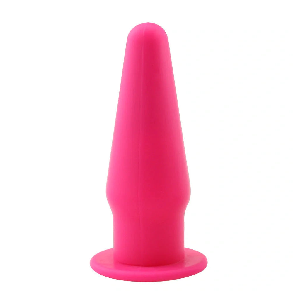 Premium silicone vibrating anal plug in black, rose red, and purple colors. Discreet and sophisticated intimate stimulator.