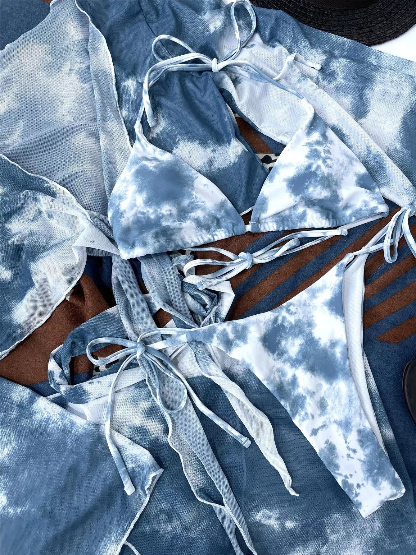 Tie dye long sleeve bikini set for women with sarong, vibrant four-piece swimwear