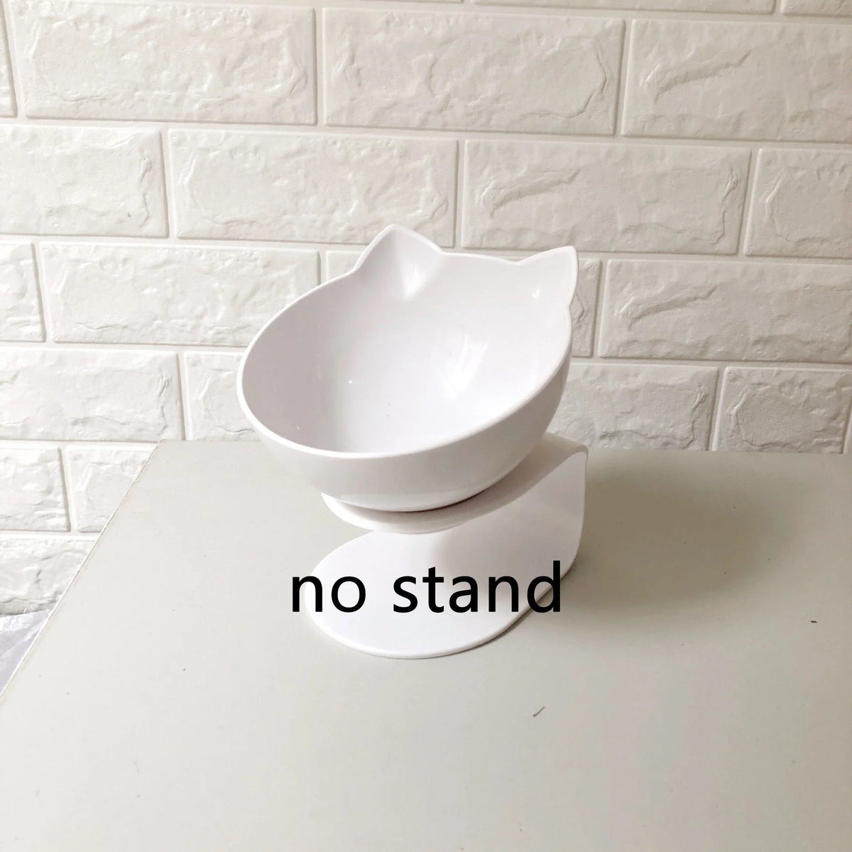 An inclined cat food bowl with a transparent design and a sturdy base, providing a comfortable and hygienic dining experience for your feline friend.