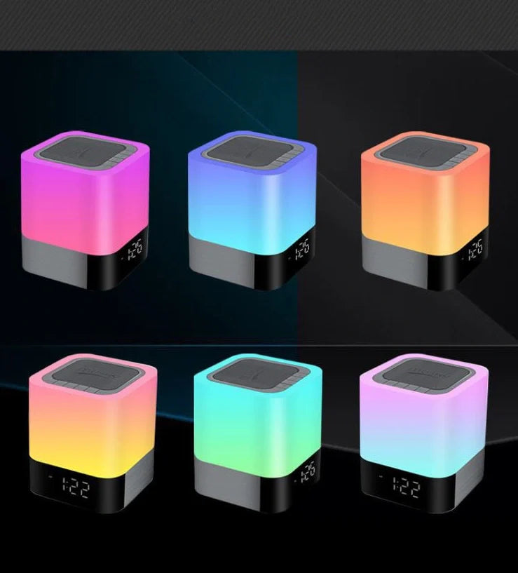 Square Bluetooth speaker alarm clock with touch screen and multi-colour LED lighting, measuring 100x100x112mm