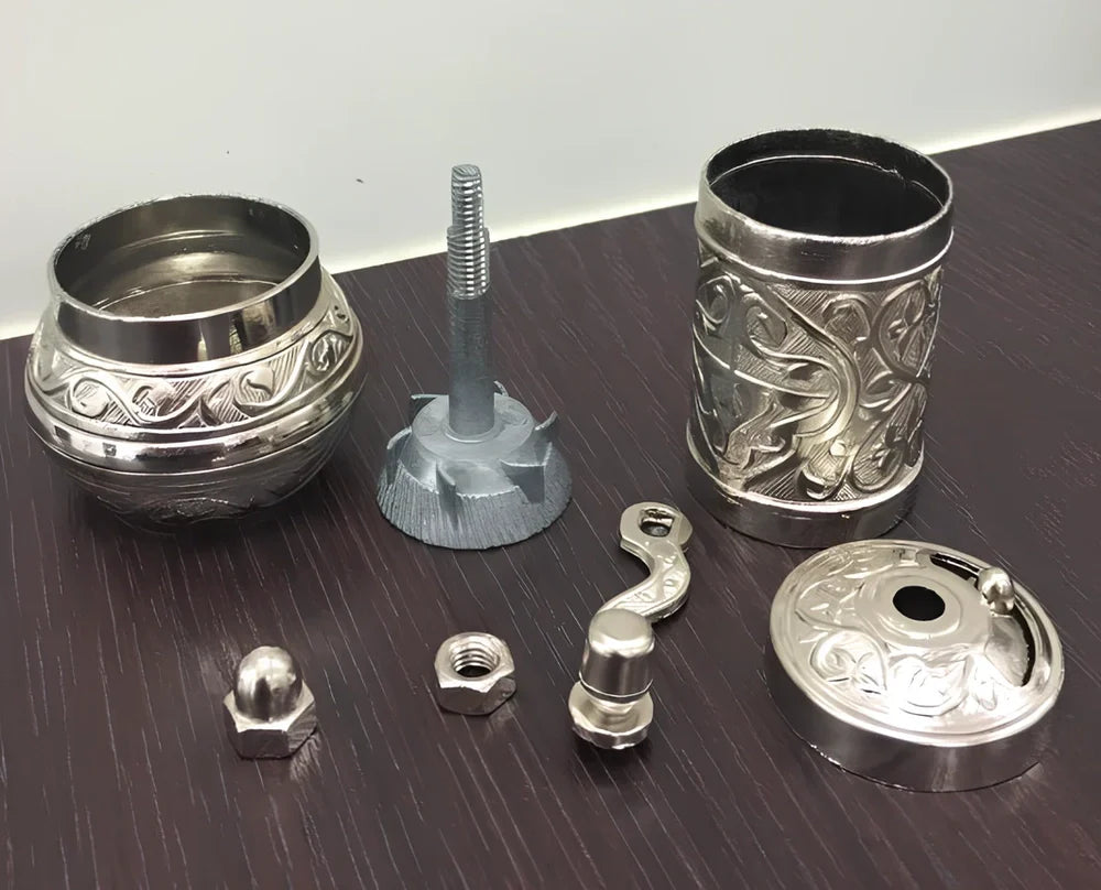 Turkish manual coffee grinder with removable ceramic burrs and compact 15cm height design