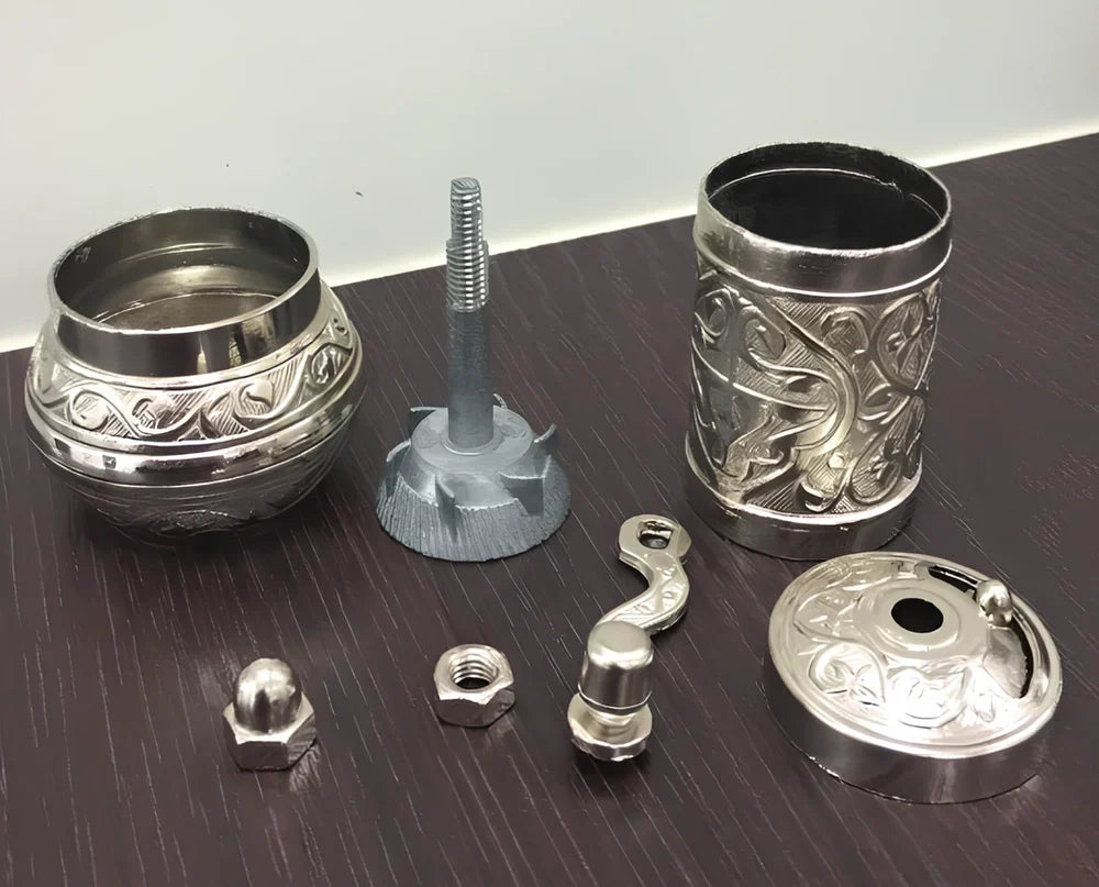 Turkish manual coffee grinder with removable ceramic burrs and compact 15cm height design