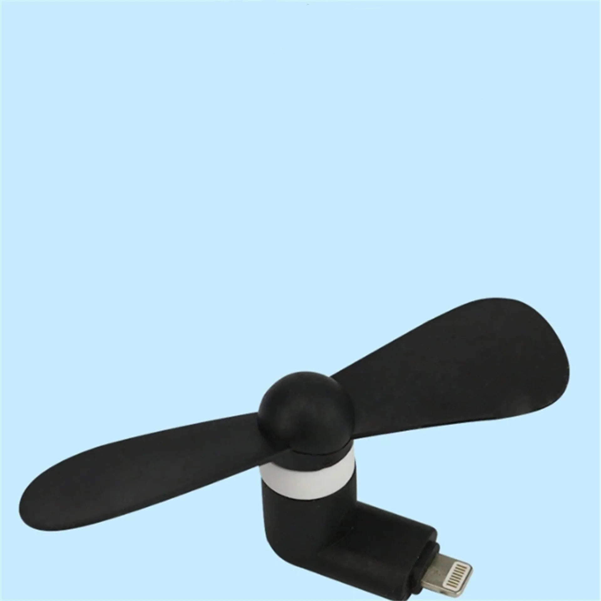 White portable mobile phone mini fan with plastic blades attached to smartphone