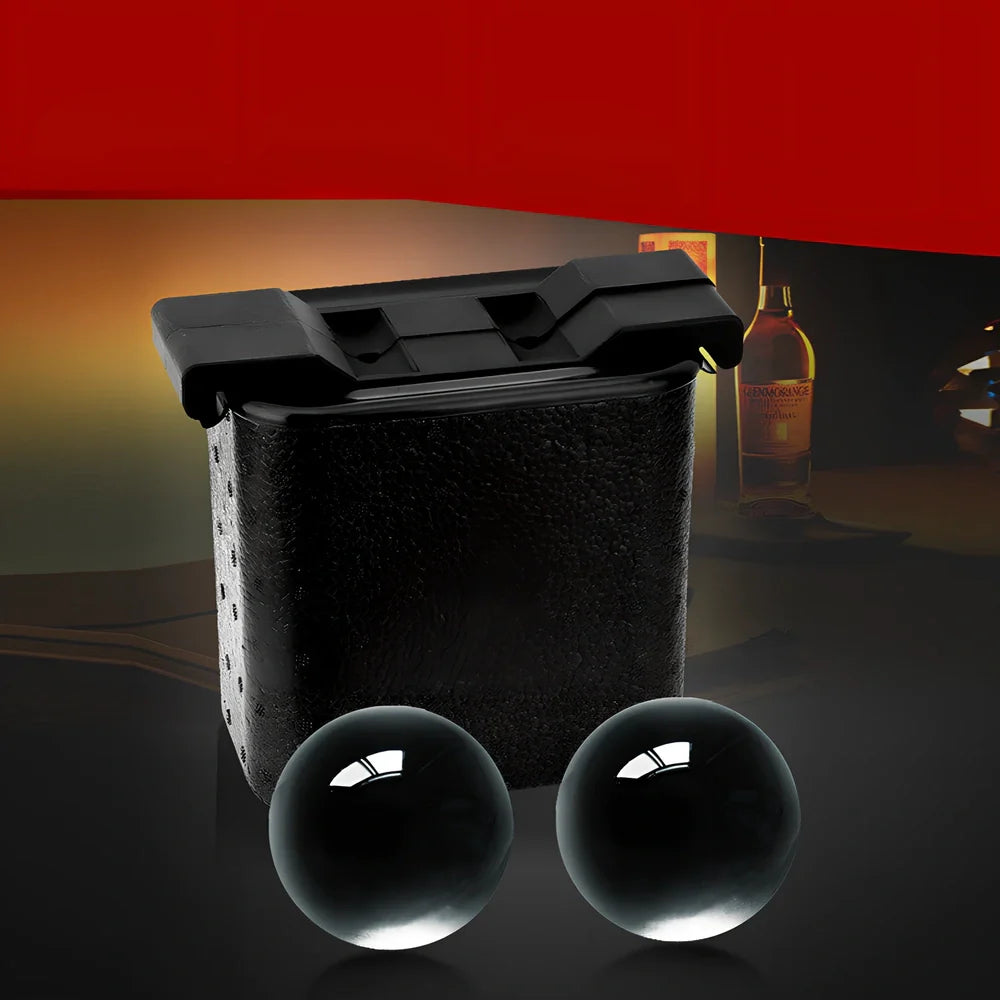 Whiskey ice cube tray with crystal clear hockey puck and skull shaped ice cubes measuring 11.5x17.5x19.5cm