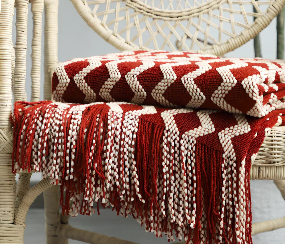 Nordic knitted decorative blanket with striped pattern and tassels in light grey colour