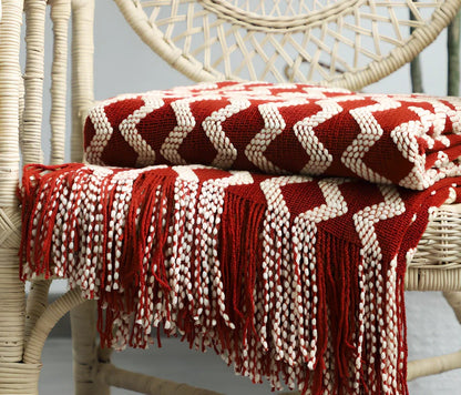 Nordic knitted decorative blanket with striped pattern and tassels in light grey colour