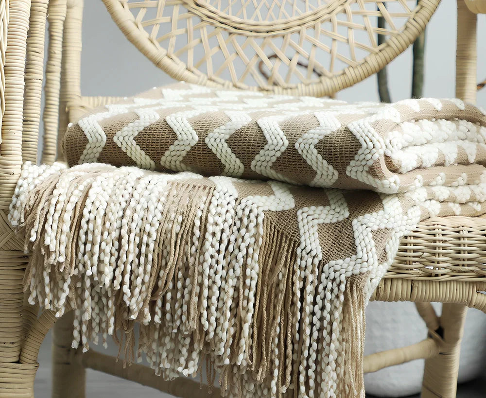 Nordic knitted decorative blanket with striped pattern and tassels in light grey colour