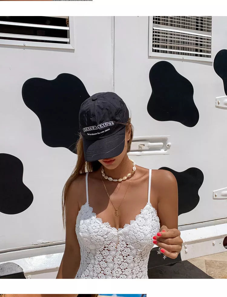 Embroidered knitted one-piece swimsuit for women in white with chest pad