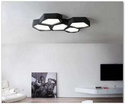 Geometric shaped LED light with iron shade in black or white frame, measuring 38×26cm with remote control