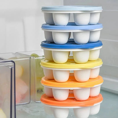 Donut-shaped ice cube molds in orange and blue, perfect for creative drink presentation.