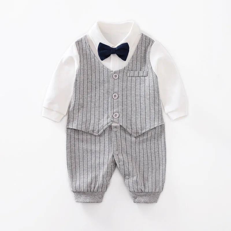 Baby boy in a long-sleeved cotton jumpsuit, gentleman style with collar, in navy blue colour.