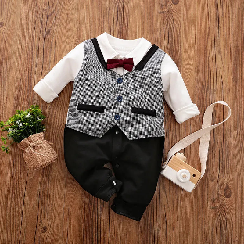 Baby boy in a long-sleeved cotton jumpsuit, gentleman style with collar, in navy blue colour.