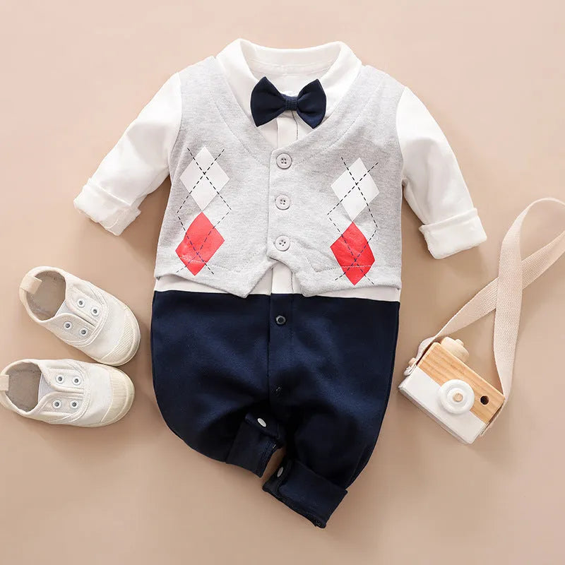 Baby boy in a long-sleeved cotton jumpsuit, gentleman style with collar, in navy blue colour.