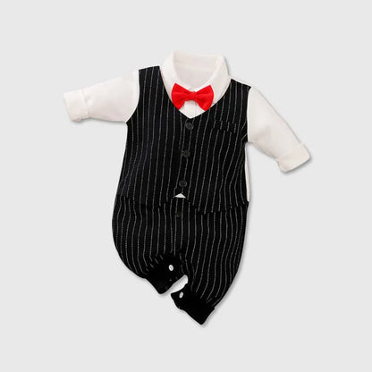 Baby boy in a long-sleeved cotton jumpsuit, gentleman style with collar, in navy blue colour.
