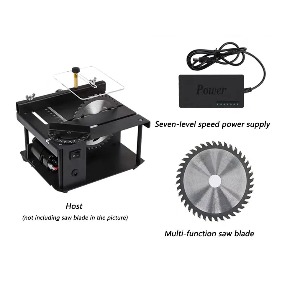 Black miniature precision table saw with 110mm blade on sliding table for woodworking